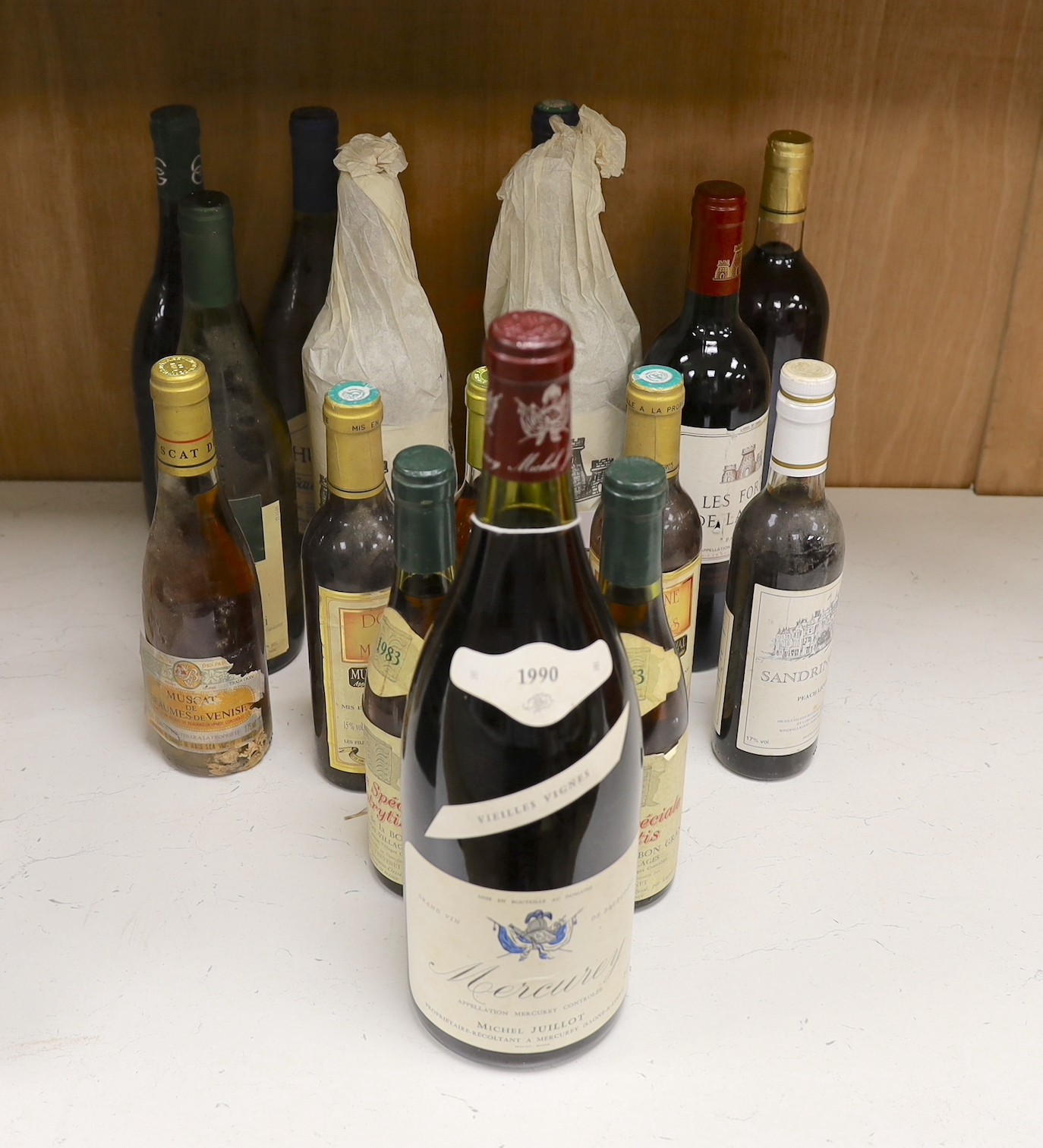 Sixteen bottles of mixed wines, including two bottles of Les Forts de Latour